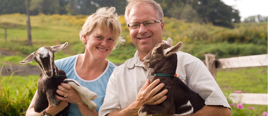 Vermont Creamery Founders holding goats 